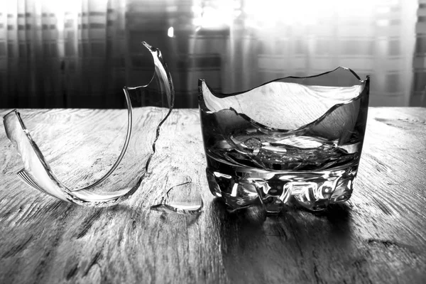 Broken whiskey glass with shrapnel — Stock Photo, Image
