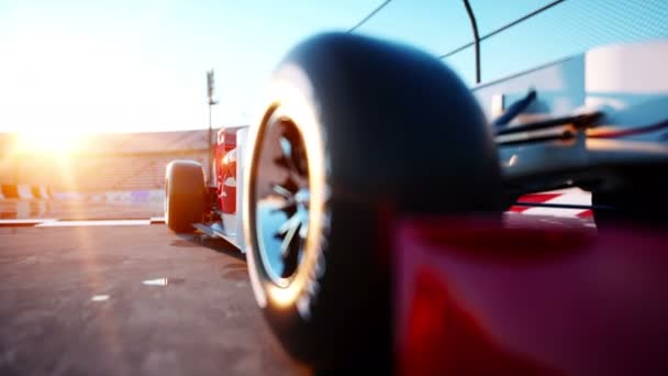 Kierowca wyścigowy Formuły 1 w samochód. Pojęcie rasy i motywacji. Wonderfull zachód słońca. Realistyczna animacja k 4. — Wideo stockowe