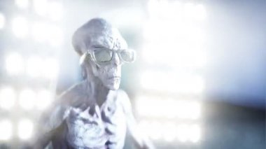 Ay'da dans komik uzaylılar. UFO kavramı. Arka plan dünyada. Alan parti. Gerçekçi 4 k animasyon.