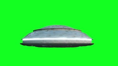 Uçan daire yeşil ekranda izole et. UFO. Gerçekçi gölgeleme ve hareket bulanıklığı. 4 k animasyon.