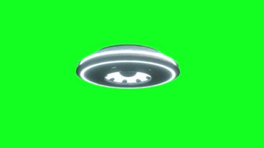 Uçan daire yeşil ekranda izole et. UFO. Gerçekçi gölgeleme ve hareket bulanıklığı. 4 k animasyon.
