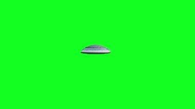 Uçan daire yeşil ekranda izole et. UFO. Gerçekçi gölgeleme ve hareket bulanıklığı. 4 k animasyon.