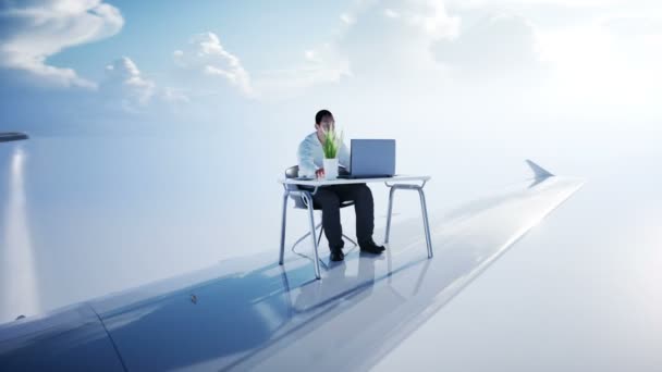 Joven hombre de negocios ocupado trabajando en el avión volador. Hombre africano mirando en la pantalla del portátil en el escritorio. Concepto de espacio de trabajo creativo. Animación realista 4k . — Vídeo de stock