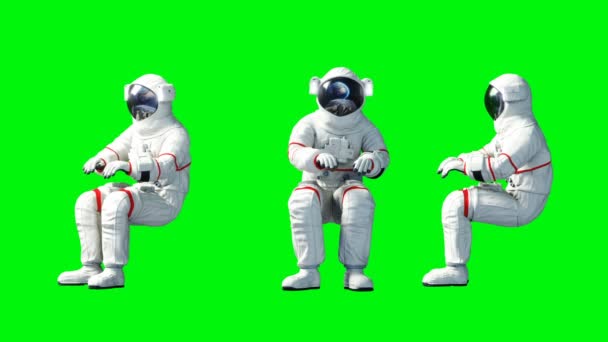 宇宙飛行士座って idlle。緑色の画面。リアル 4 k アニメーション. — ストック動画