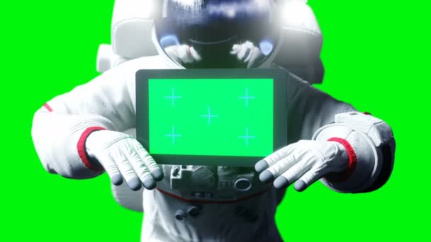 Astronaut in space with tablet, monitor. Green screen tracking footage. Realistic 4k animation. — Stock Video