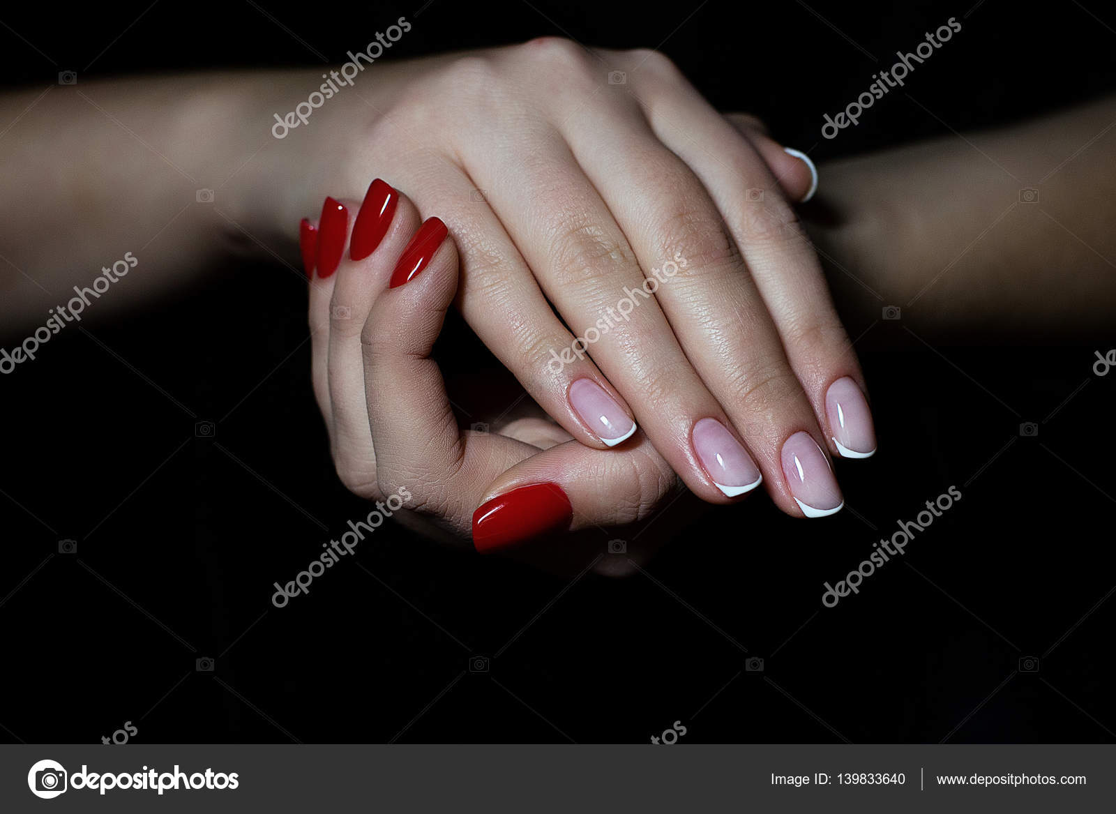 Hands With French Manicure And Red Gel Polish Stock Photo