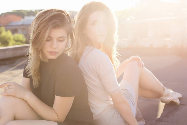 Portrait of two ballerinas on the roof