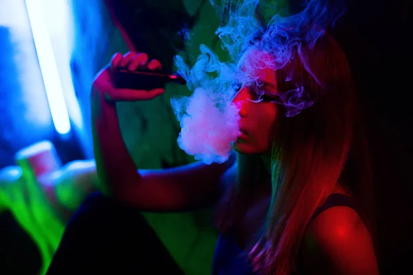 Fashion art portrait of beauty model woman in bright lights with colourful smoke. — Stock Photo, Image