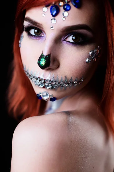 Fashion model with halloween skull makeup with glitter and rhinestones — Stock Photo, Image