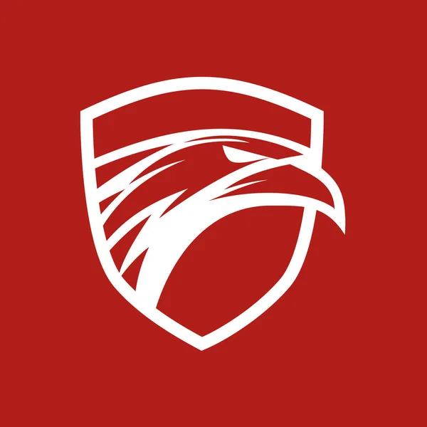 Kartal başını kırmızı zemin üzerine Logo kalkan — Stok Vektör
