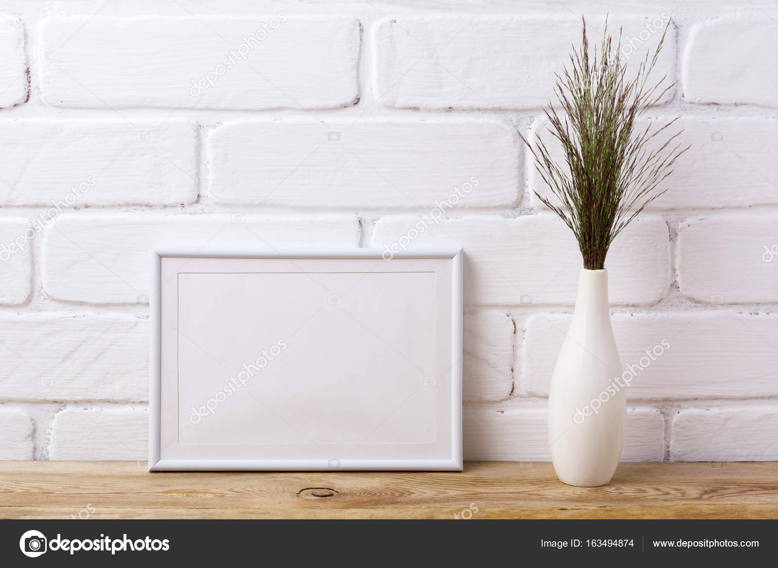 Download White Landscape Frame Mockup With Dark Grass In Elegant Vase Stock Photo C Tasipas 163494874 PSD Mockup Templates