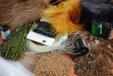Fly tying materials and tools clipart