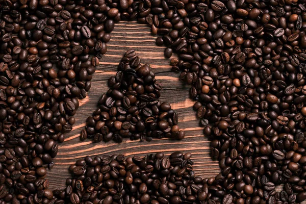 Levél egy felirat a kávébab, a fa tábla — Stock Fotó