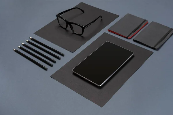 Modern mock up flat lay of notebook and stationery on gray background. — Stock Photo, Image