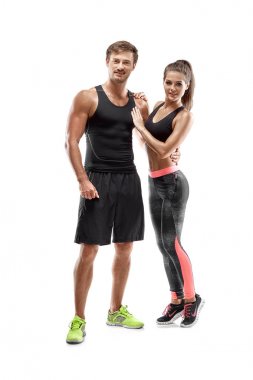 Kadın ve adam Studio beyaz arka plan üzerinde genç sporcuların Çift