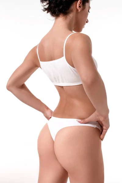 Szép egészséges karcsú női test ráférjen fehér háttér — Stock Fotó