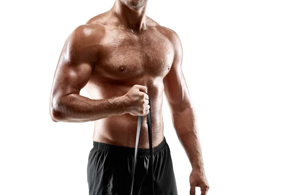 肖像年轻性感英俊的男人的强运动员身体与裸露躯干。摆上白色工作室背景 — 图库照片