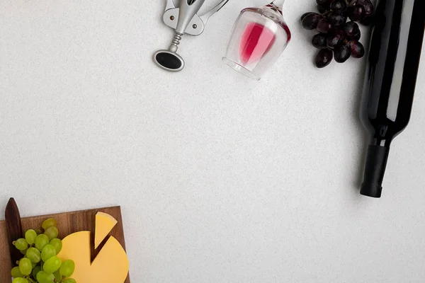 Wine, glasses and corkscrew over white background. Top view — Stock Photo, Image