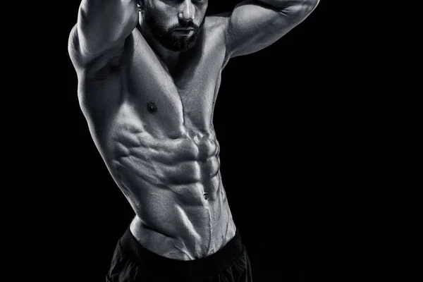 Muscular bodybuilder guy doing posing — Stock Photo, Image