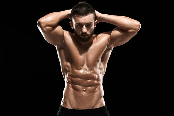 Muscular culturista chico haciendo posando — Foto de Stock