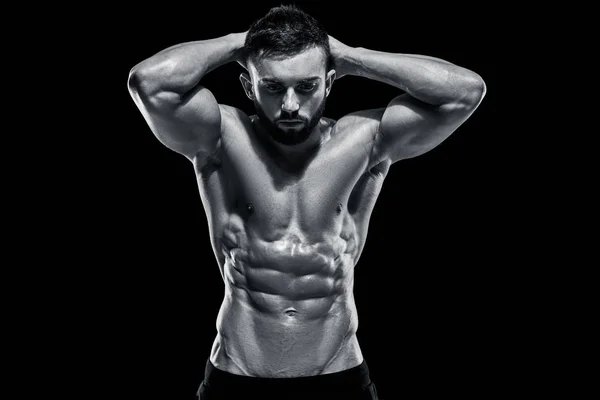 Muscular bodybuilder guy doing posing — Stock Photo, Image