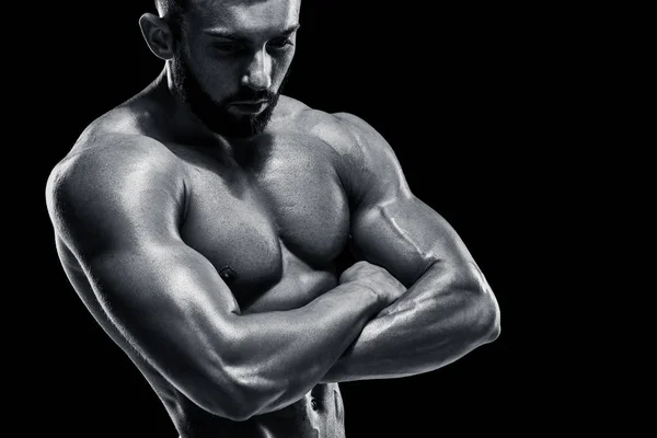 Muscular bodybuilder guy doing posing — Stock Photo, Image