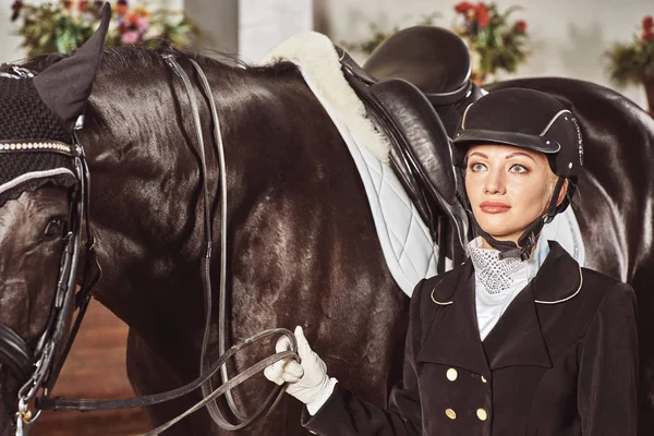 Woman jockey with his horse — Stock Photo, Image