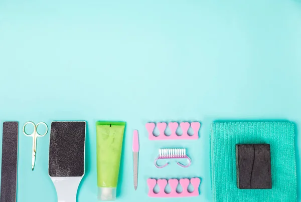 Top view of manicure and pedicure equipment on blue background Stock Image