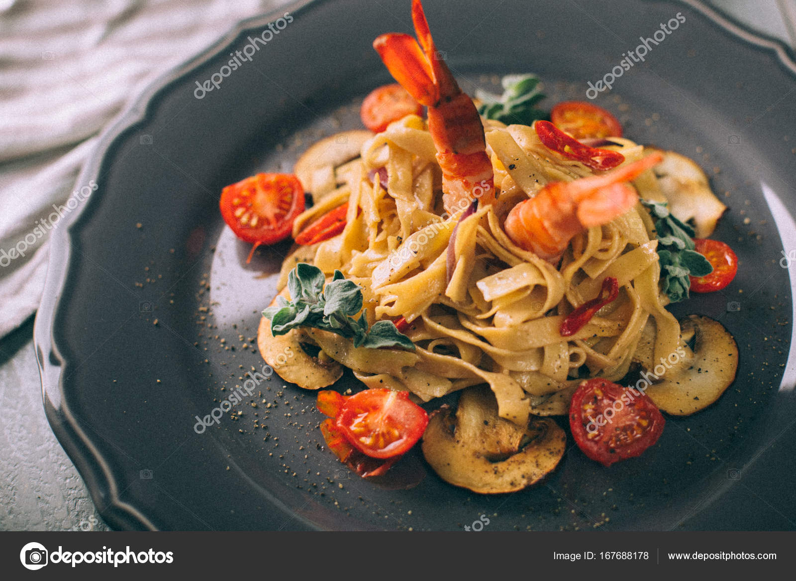 Noodles with shrimp and mushrooms. Spaghetti Stock Photo by ©nazarov
