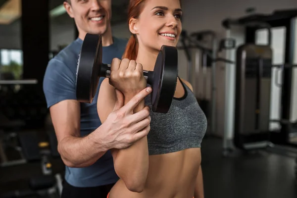 Happy cutie athletic girl , execute exercise in sport-hall — Stock Photo, Image