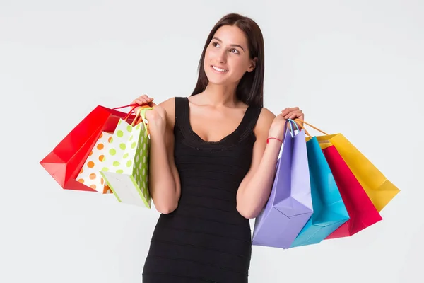 Happy young smiling woman with shopping bags after shopping Stock Picture