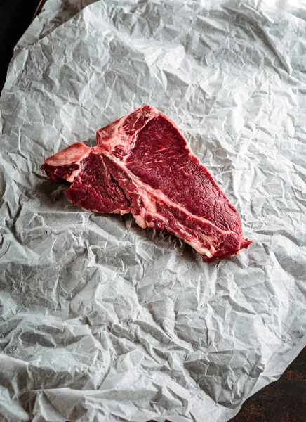 Raw meat Ribeye steak entrecote on wooden background — Stock Photo, Image