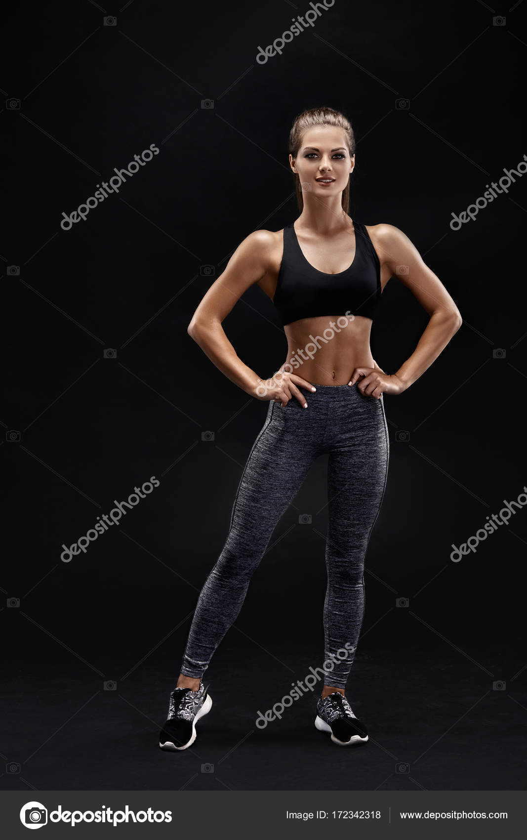 Strong Woman in Combat Pose Looking at Camera Stock Photo - Alamy