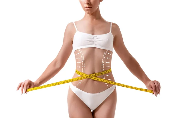 Corpo femminile con le frecce di disegno su di esso isolato su bianco. Concetto di perdita di grasso, liposuzione e rimozione della cellulite . — Foto Stock