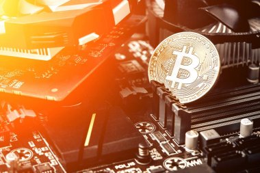 Bitcoin. Yeni sanal para. Bitcoins ekran kartı incelemesi kavramı üzerinde yalan. Güneş parlaması