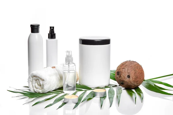 Organic cosmetics with coconut on white background. — Stock Photo, Image