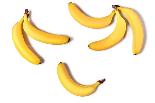 Dojrzałe banany żółte na białym tle — Zdjęcie stockowe