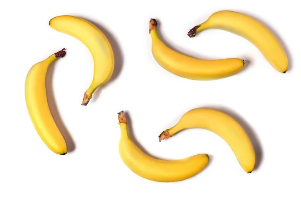 Dojrzałe banany żółte na białym tle — Zdjęcie stockowe