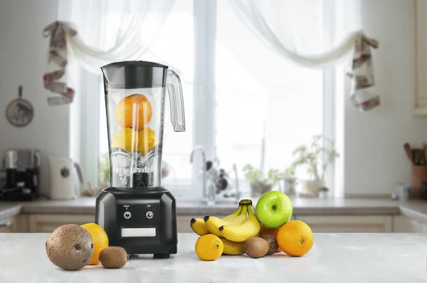 Blender and fruits on kitchen space