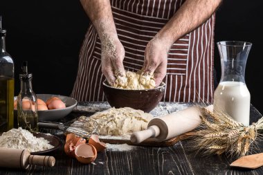 Mens eller arka planı hamur yoğurmak. Yemek Unlu Mamüller veya hamur ekmek, kek, pasta, pizza hamuru için malzemeler .