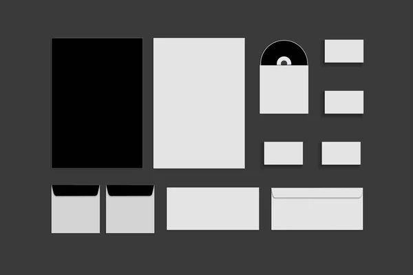 Modello di cancelleria di colore bianco e grigio nero, un modello per l'identificazione del marchio su sfondo grigio. Buste, fogli di carta — Foto Stock