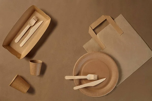 Eco friendly disposable tableware. Biodegradable craft dishes. Recycling concept. Also used in fast food, restaurants, takeaways, picnics. Close-up.