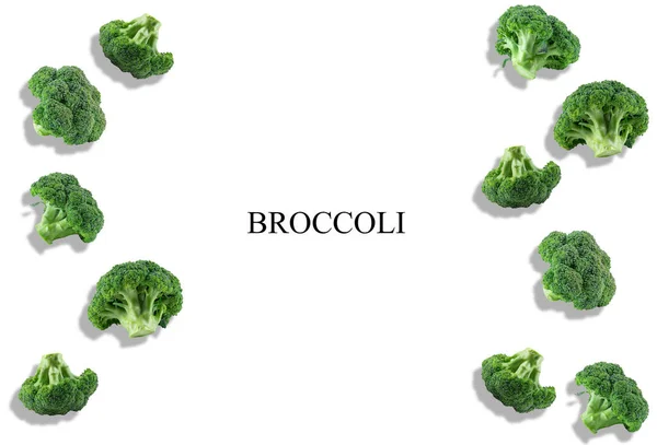 Fresh, green broccoli isolated on white background with inscription broccoli and copy space for text or images. Vegetable. Close-up, top view. — Stock Photo, Image