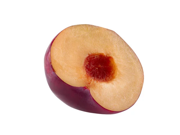 Half of smooth-skinned, purple plum fruit without kernel isolated on white background with copy space for text or images. Side view. Close-up. — Stock Photo, Image