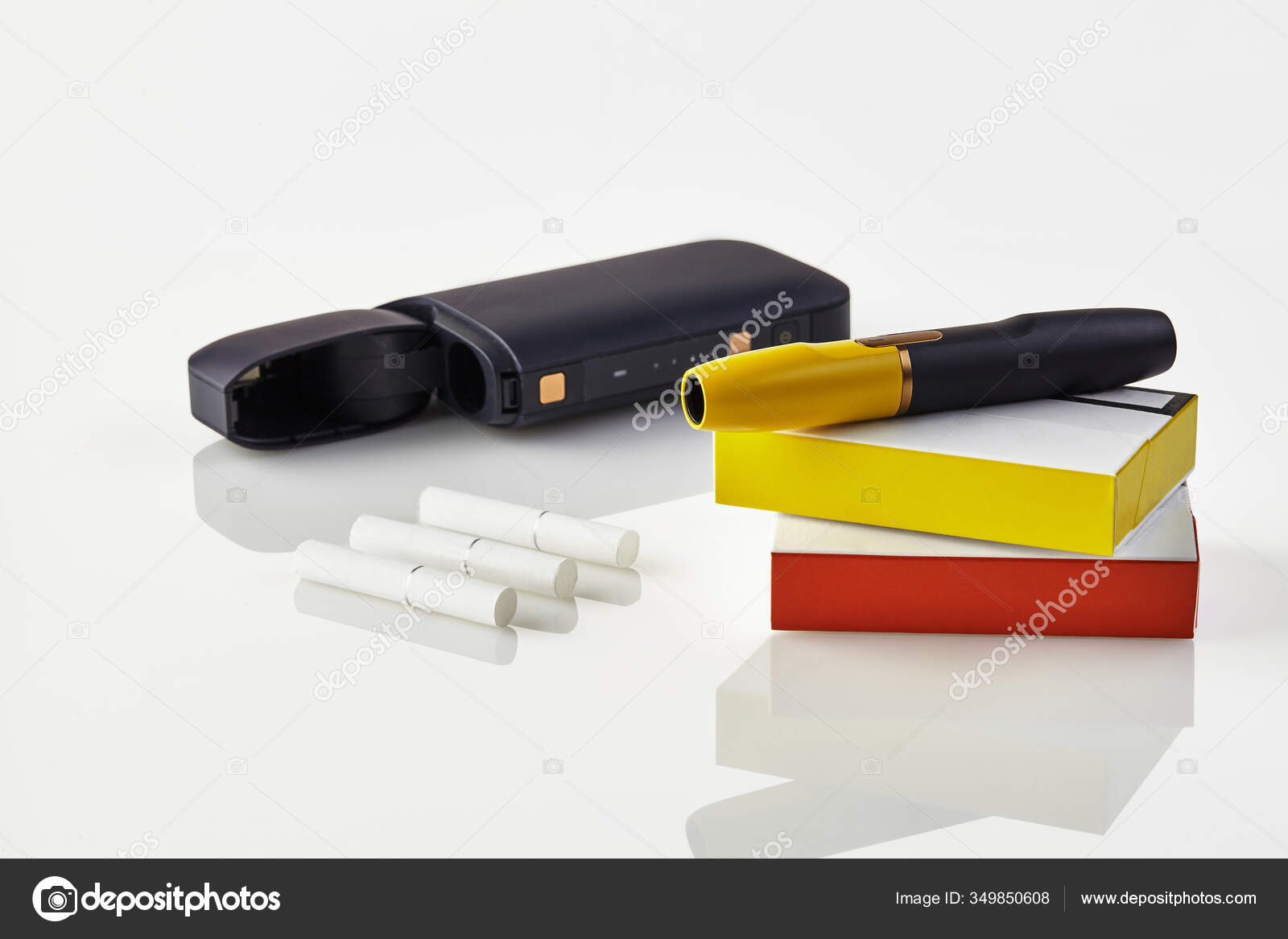 Download Black Electronic Cigarette Is On Packs With Red And Yellow Sides Open Battery Three Heatsticks Isolated On White Heating Tobacco System Close Up Stock Photo Image By C Nazarov Dnepr Gmail Com 349850608