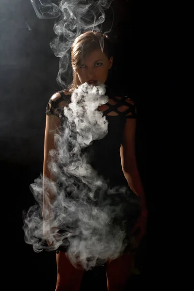 Beautiful girl vaping from e-cigarett — Stok Foto