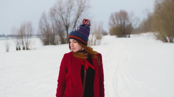 Portrait of beauty woman with long ginger hair is looking at camera — Stock Video