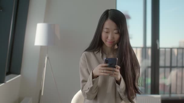 Young charming asian girl employee of a large IT company — Stock Video