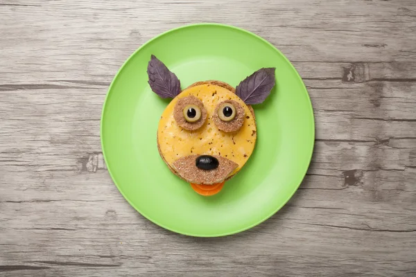 Funny dog made of bread and cheese — Stock Photo, Image