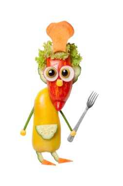 Çatal ile komik aşçı sebze yapılan